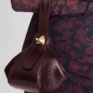 Scuplted Metal Wristlet Bag